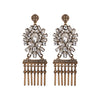 alt= "Statement bohemian gold earrings with crystal and metal tassel detailing"